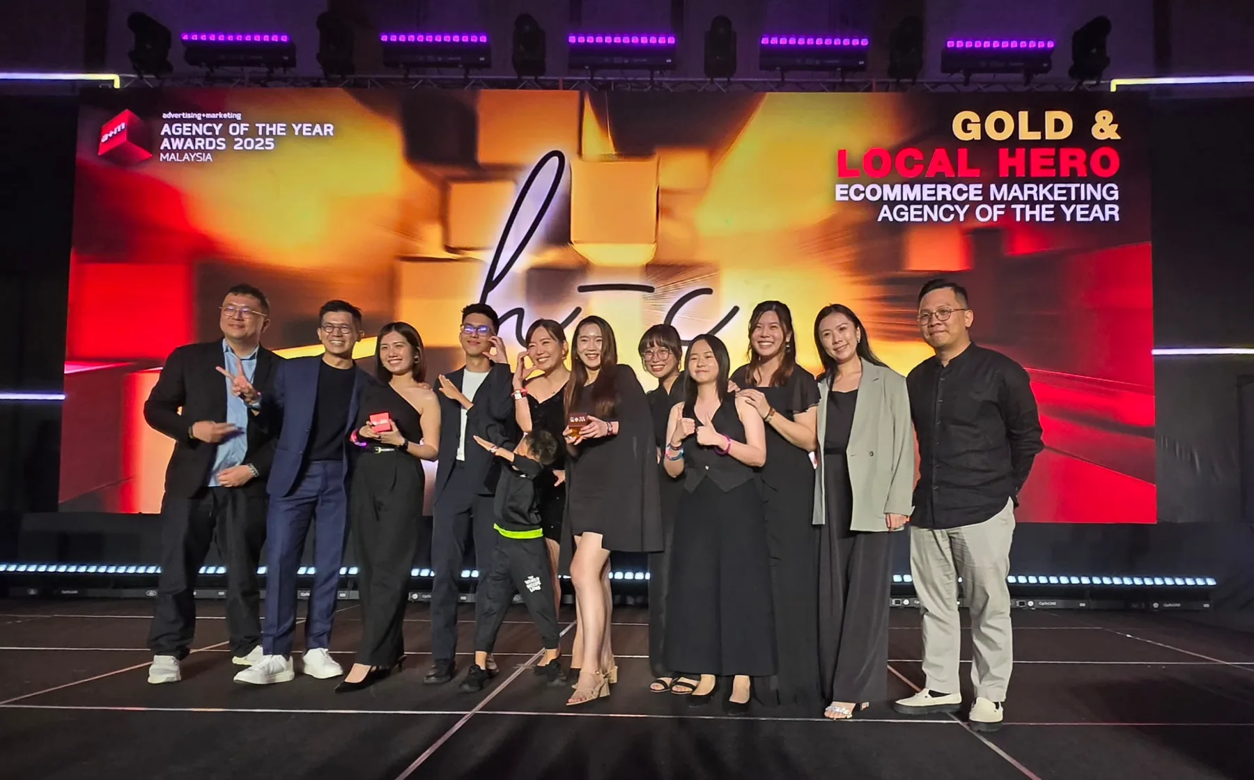 The team on stage for Gold and Local Hero, eCommerce Marketing Agency of the Year, Agency of the Year Awards Malaysia 2025